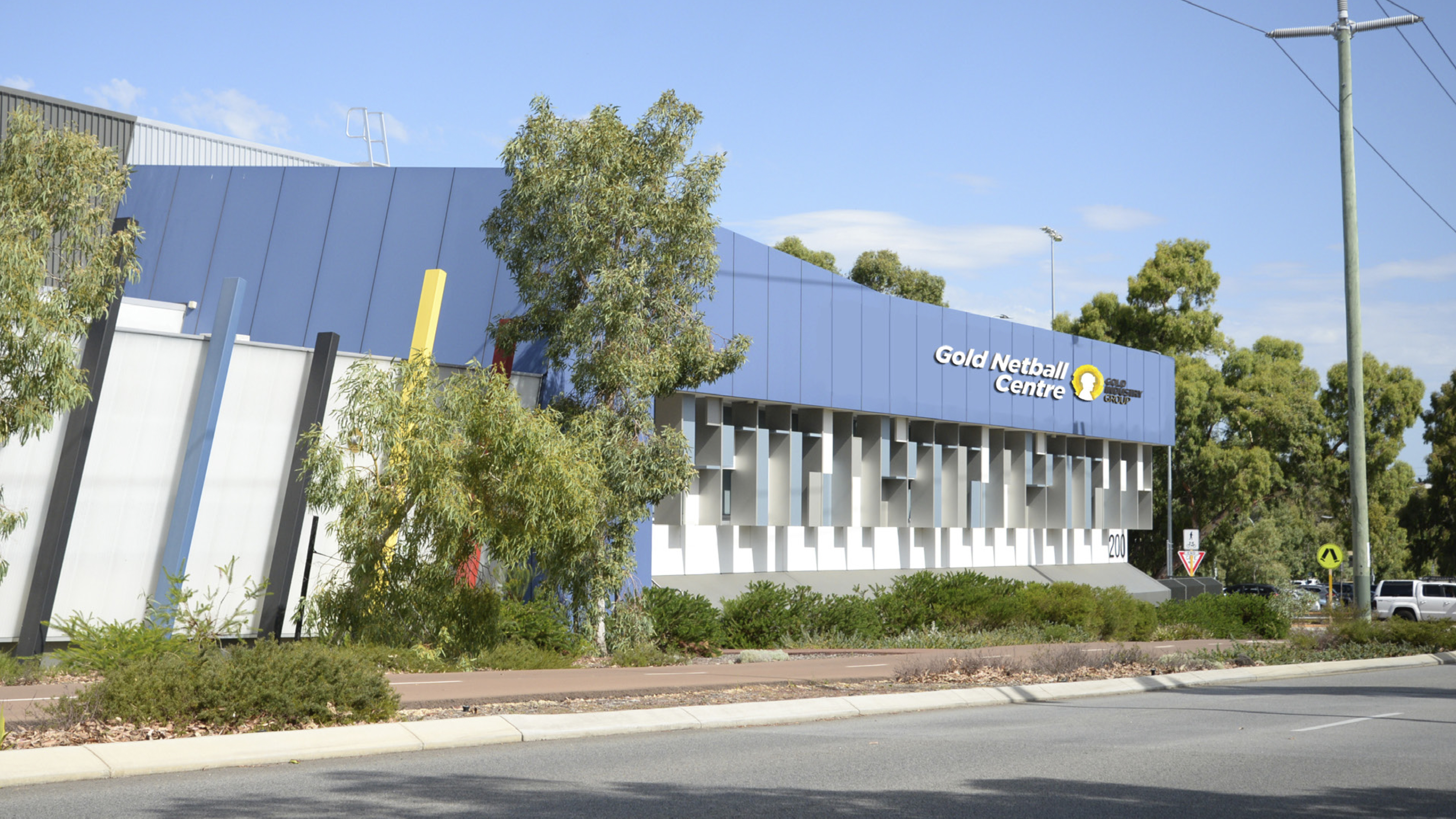 A photo of the street side of the main building exterior at the Gold Netball Centre in Jolimont, Perth
