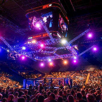 A photo taken from the crowd of a UFC match at RAC Arena in Perth