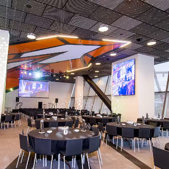 A photo of tabes and chairs set up in the Granite Room at RAC Arena in Perth