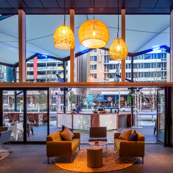 A photo of a seating area overlooking buildings at RAC Arena in Perth